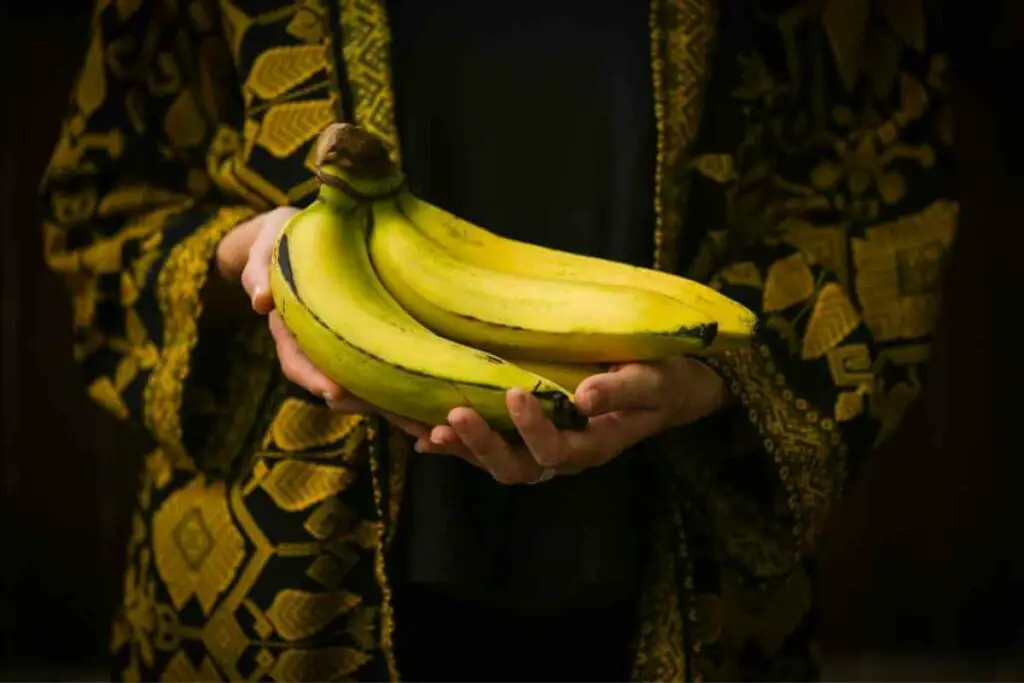 A women holding organic banana