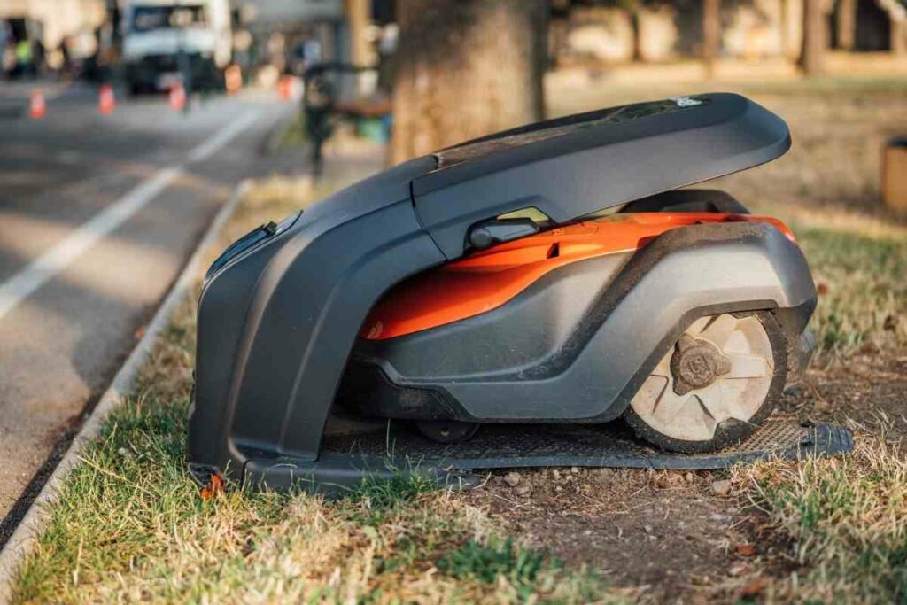 Parked Robotic mower in a park