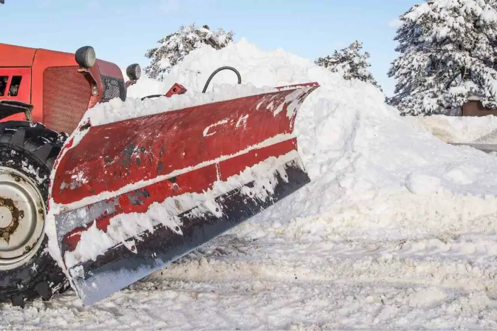 Snow tractor plough tips