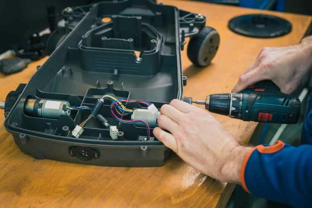 servicing a robotic mower