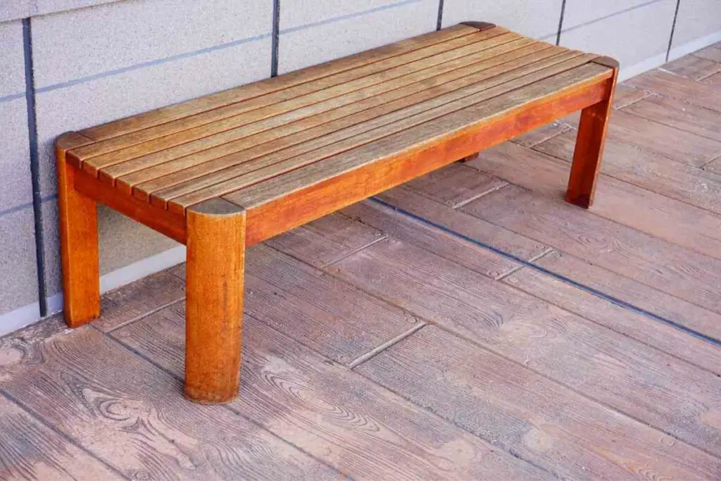Simple wooden bench in garden