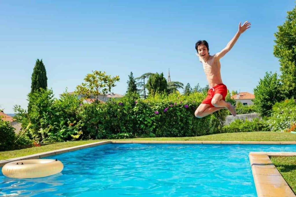 Grass around backyard pool