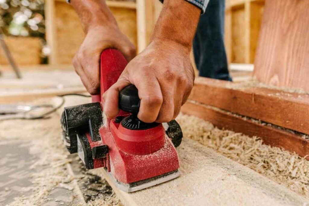 Sand down the wooden parts swing set