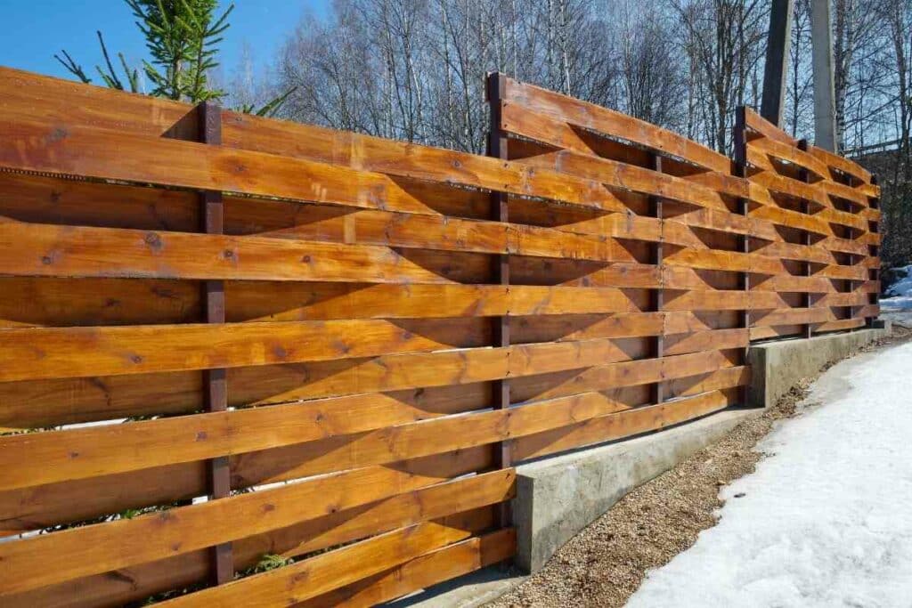 Terraced horizontal wood fence idea