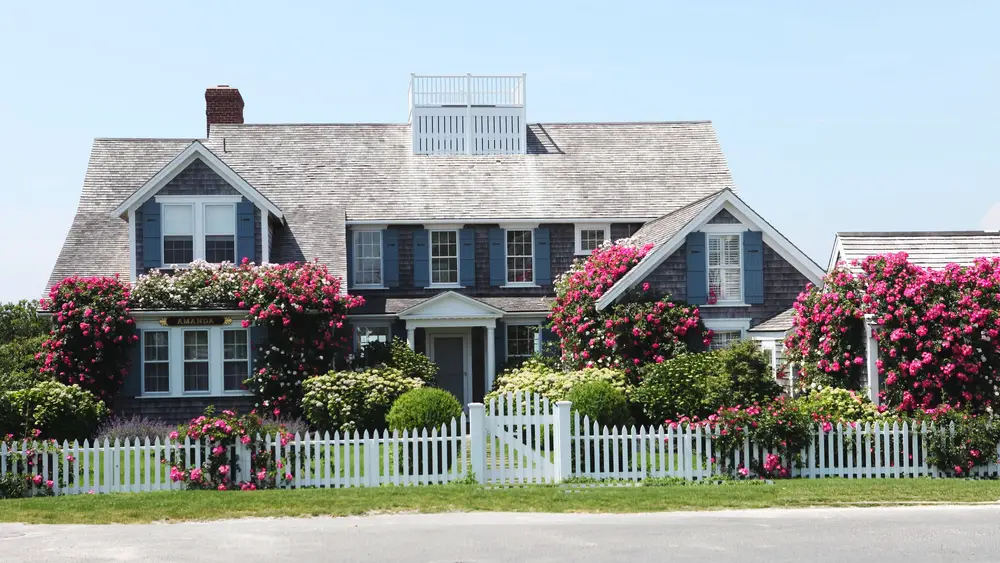 Cape Cod house with garden.