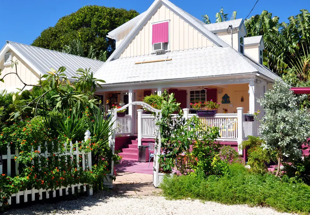 Cottage with garden in Key West, Florida on a sunny day.